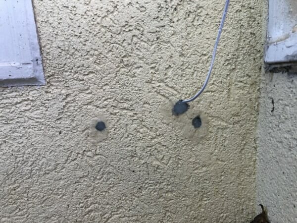Sealed off holes in stucco wall